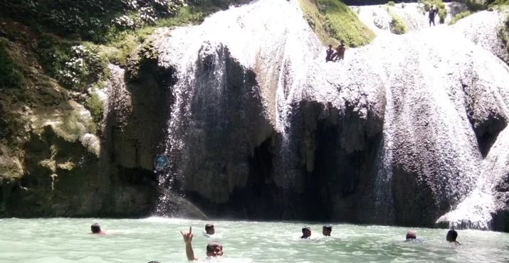 Air Terjun Kalimalima, Serpihan Surga Tersembunyi di Tebing Bukit Batukara