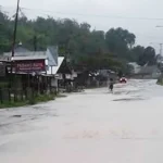 Hujan Sejam, Jalan Trans Wanggudu Tergenang Air Hujan Sejam, Jalan Trans Wanggudu Tergenang Air