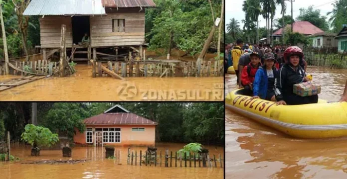 Akses Jalan Putus Akibat Banjir, Polres Muna Turunkan Puluhan Personil Bantu Warga Menyeberang