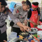 Ketika Anggota Brimob Sultra Turun Tangan Memasak Ikan Sidat Ketika Anggota Brimob Sultra Turun Tangan Memasak Ikan Sidat