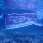 Peringati Lahirnya Pancasila, Imigrasi Wakatobi Kibarkan Merah Putih di Dalam Laut Peringati Lahirnya Pancasila, Imigrasi Wakatobi Kibarkan Merah Putih di Dalam Laut