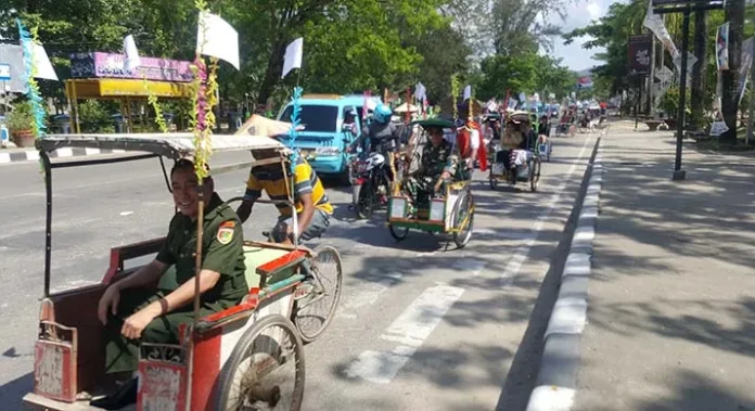 hari_pahlawan_swiss Peringati Hari Pahlawan, Karyawan Swissbel Kendari Keliling Kota Pakai Becak