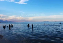 Keelokan Pantai Toronipa, Kesejukan di Laut Biru Pantai Toronipa Kendari, wisata sultra, wisata kendari
