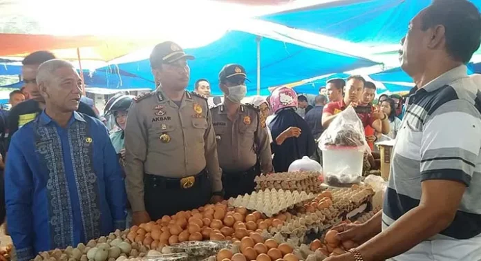 Antisipasi Lonjakan Harga, Satgas Pangan Polres Konawe Sidak di Pasar Wawotobi