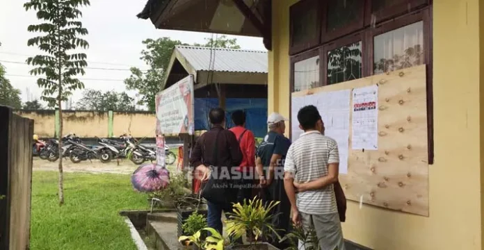 Hujan Tak Surutkan Semangat Warga Datang ke TPS