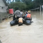 Hujan dan Banjir, Warga Wanggu Diberi Kemudahan Memilih di TPS Emergency Hujan dan Banjir, Warga Wanggu Diberi Kemudahan Memilih di TPS Emergency