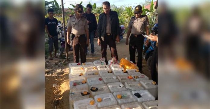 Polsek Poasia Ungkap Penampungan 700 Liter Arak di Sekitar Kampus