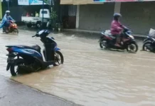 Saluran Irigasi Meluap, Jalan Raya Tergenang Saluran Irigasi Meluap, Jalan Raya Tergenang