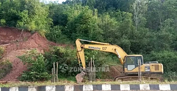 pu konut Dinas PU Konut Bersihkan Genangan Air dan Tanah Longsor di Wanggudu