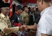 Nelayan di Molawe Dapat Bantuan Rumah Pengasapan dan Mesin Katinting