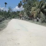 Jalan Poros Ereke-Baubau: Panas Berdebu, Hujan Berlumpur Jalan Poros Ereke-Baubau: Panas Berdebu, Hujan Berlumpur