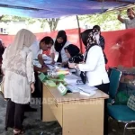 Pakai Baju Putih, Bupati Kolut Mencoblos di TPS 7 Lasusua Pakai Baju Putih, Bupati Kolut Mencoblos di TPS 7 Lasusua