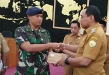 Pemkot Baubau Beri Dana Hibah ke Pos TNI AL Pemkot Baubau Beri Dana Hibah ke Pos TNI AL