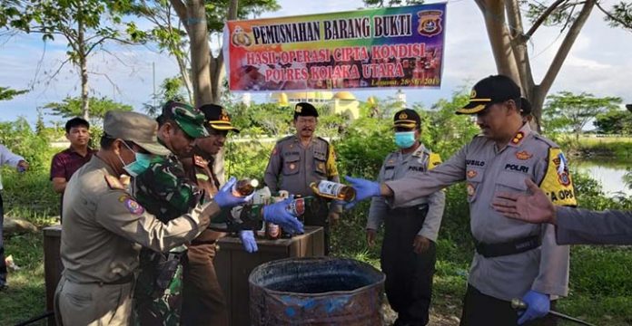 Kapolres Kolut Pimpin Pemusnahan Puluhan Liter Miras