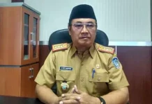 ASN Kolaka Kembali Salurkan Bantuan Guna Penanganan Covid-19 Sekretaris Daerah (Sekda) Pemerintah Kabupaten Kolaka, Poitu Murtopo