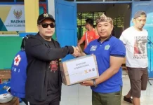Garda Pemuda Nasdem Bantu Korban Banjir Konawe Garda Pemuda Nasdem Bantu Korban Banjir Konawe