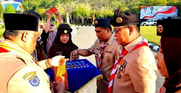 Ruksamin Terima Penghargaan Lencana Melati dan Karya Bhakti Pramuka