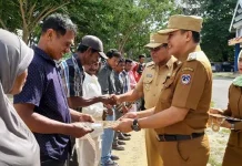 Pemkab Mubar Berikan 300 Sertifikat Tanah Gratis untuk Nelayan Pemkab Mubar Berikan 300 Sertifikat Tanah Gratis untuk Nelayan