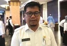Buka Layanan Tatap Muka, DPMPTSP Sultra Terapkan Protokol Kesehatan Kepala DPMPTSP Provinsi Sultra Masmudin