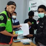 Cegah Virus Corona, Gojek Bagikan Ribuan Masker ke Driver di Kendari Cegah Virus Corona, Gojek Bagikan Ribuan Masker ke Driver di Kendari