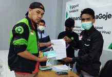 Cegah Virus Corona, Gojek Bagikan Ribuan Masker ke Driver di Kendari Cegah Virus Corona, Gojek Bagikan Ribuan Masker ke Driver di Kendari