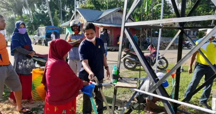 mubar corona Aleg di Mubar Siapkan 2 Tangki Air untuk Cuci Tangan di Pasar