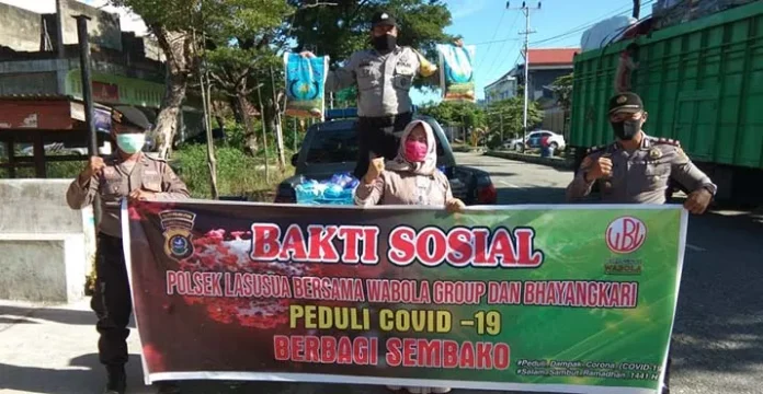 Polsek Lasusua dan Wabola Group Salurkan Sembako Bagi Warga Terdampak Covid-19