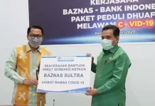 Peduli Pekerja Informal, BI Beri Bantuan Sembako dan Masker Peduli Pekerja Informal, BI Beri Bantuan Sembako dan Masker