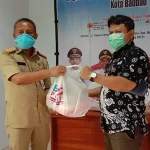 BRI Serahkan 100 Paket Sembako ke Gugus Tugas Covid-19 Baubau BRI Serahkan 100 Paket Sembako ke Gugus Tugas Covid-19 Baubau