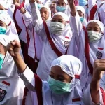 Dikbud Sultra Bagikan Cuci Tangan Portable dan Masker ke Sekolah Ilustrasi masker sekolah