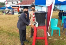Peserta Upacara di Mubar Diwajibkan Cuci Tangan Sebelum Masuk Lapangan Kabag Humas dan Protokoler Mubar Ali Abdin