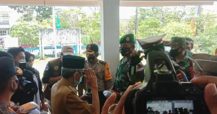 Sosialisasi Perwali Covid-19 di Baubau, Pemkot Bagi 17 Ribu Masker