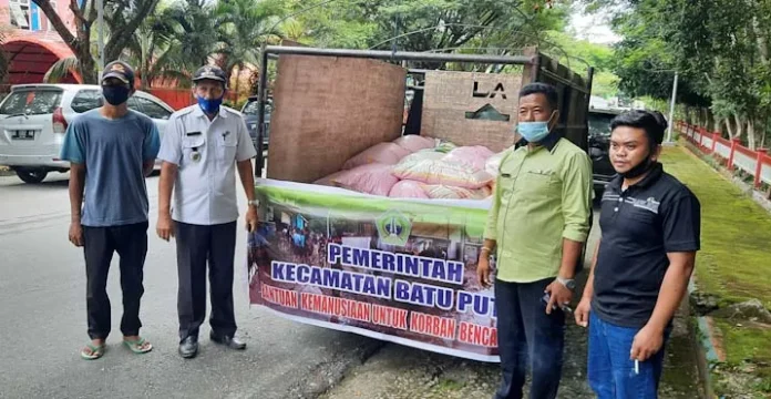 PSX_20201223_230659 Satu Ton Beras dan Sembako Disalurkan untuk Korban Banjir di Kolut