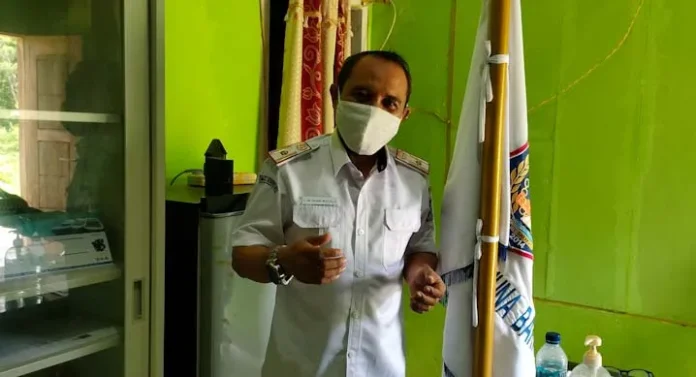 PSX_20210414_183120 Kepala Dinas Kesehatan (Dinkes) Mubar, LM Ishar Masiala