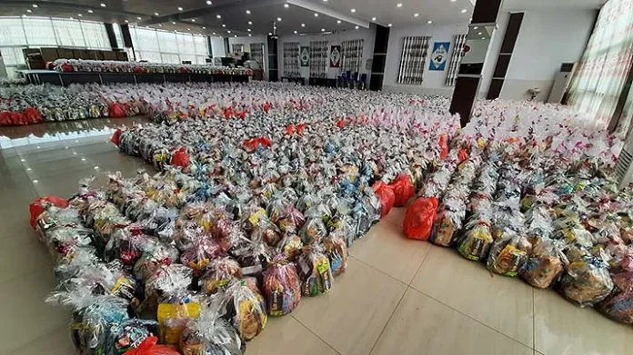 VDNI dan OSS Tebar 25 Ribu Parcel Lebaran ke Karyawan dan Masyarakat Sekitar