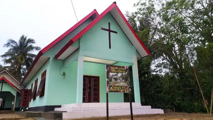 PSX_20210712_223020 TMMD Koltim, Pembangunan Gereja Weare Mendekati Tahap Akhir