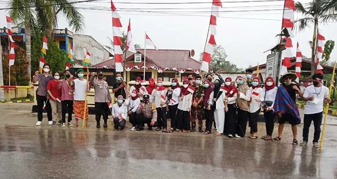 polsek abeli Polsek Abeli Gelar Hening Cipta Dua Menit di Pinggir Jalan