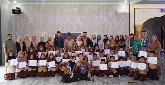 Duta Bahasa Sultra dan UKM Penalaran UHO Lestarikan Bahasa Daerah Tolaki di Kalangan Pelajar