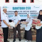 PT ANTAM Bersama Mitra Bantu Korban Banjir Desa Mandiodo Kecamatan Molawe PT ANTAM Bersama Mitra Bantu Korban Banjir Desa Mandiodo Kecamatan Molawe