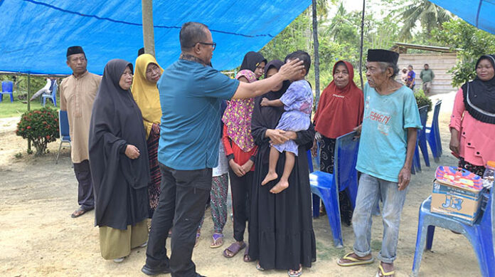 Pj Bupati Mubar Beri Bantuan kepada Keluarga Korban Penembakan di Papua