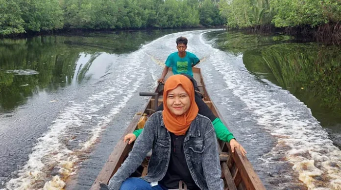 Mengenal Resti, Mantri BRI Tangguh yang Melayani Masyarakat Sungai Guntung