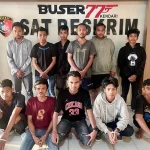 Polisi Amankan 11 Pria di Lorong Depan Kampus UHO Polisi Amankan 11 Pria di Lorong Depan Kampus UHO