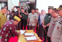 Penjabat Bupati Konawe Teken NPHD Pengamanan Pilkada 2024 Penjabat Bupati Konawe Teken NPHD Pengamanan Pilkada 2024